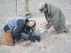 OFG filming a close-up of fossil bone fragment